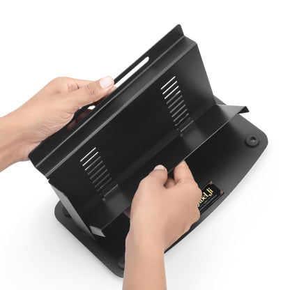 Person holding Labelji label applicator showing compact size and easy grip design for manual labeling