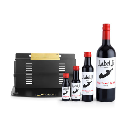Labelji label applicator with multiple sized round bottles showing label results from 30ml to 1000ml